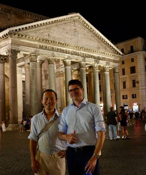 Professors Wenhui Xie and Andrew Spear in front of Pantheon in Rome, Italy at night.